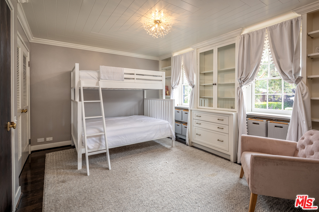 548 Dryad Road Santa Monica, CA 90402 - Photo 15 of 34 a bedroom with a dresser and a window