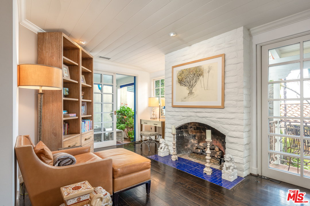 548 Dryad Road Santa Monica, CA 90402 - Photo 20 of 34 a living room with furniture and a fireplace
