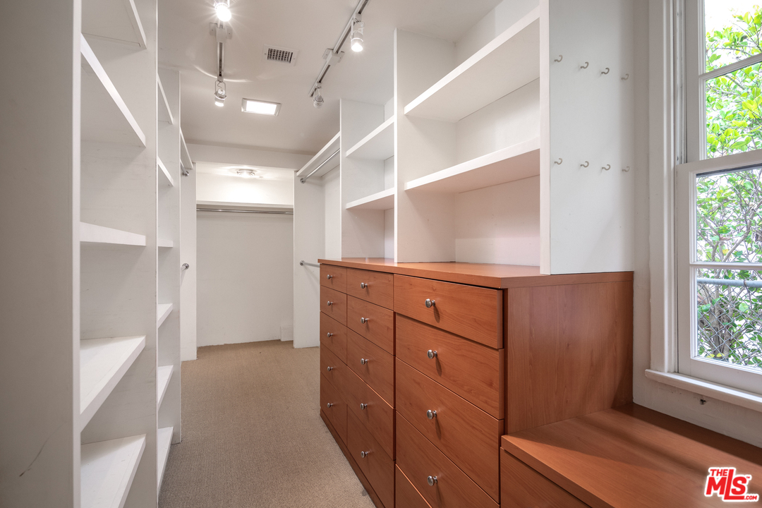 548 Dryad Road Santa Monica, CA 90402 - Photo 23 of 34 a view of a hallway with windows