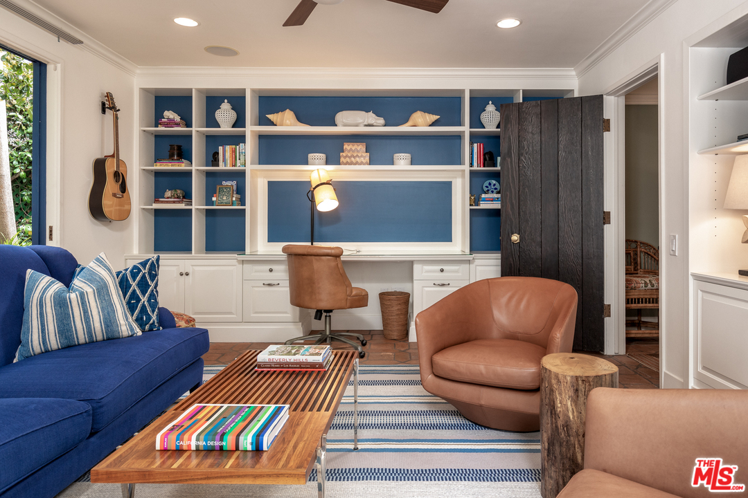 548 Dryad Road Santa Monica, CA 90402 - Photo 10 of 34 a living room with furniture a rug and a window