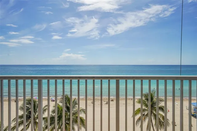 a balcony with outdoor view
