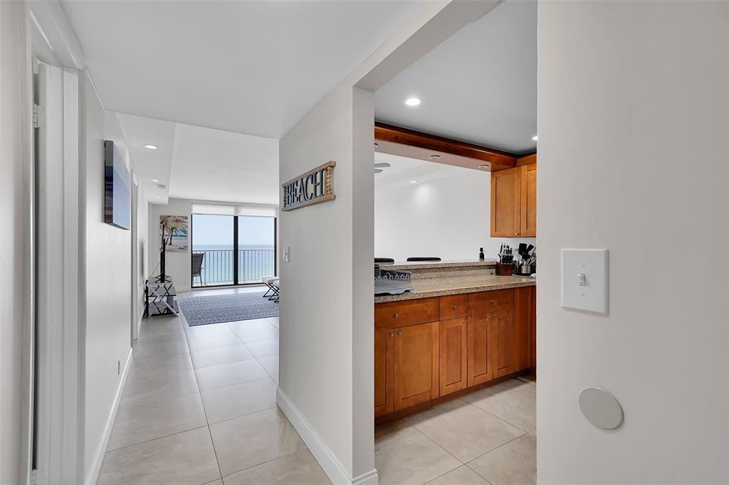 400 North Surf Road, Unit 703 Hollywood, FL 33019 - Photo 16 of 50 a view of a kitchen cabinets and a counter place