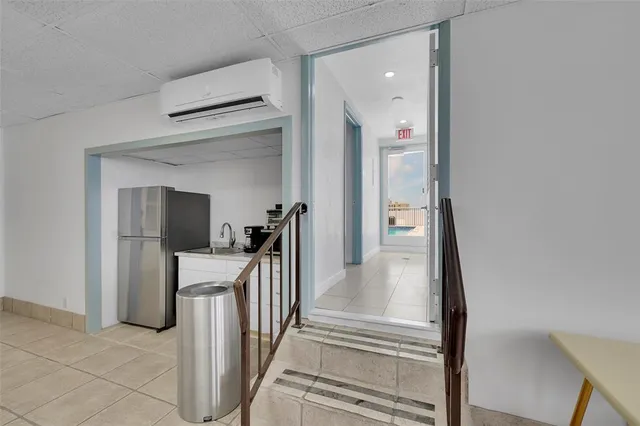 a view of a hallway view with staircase