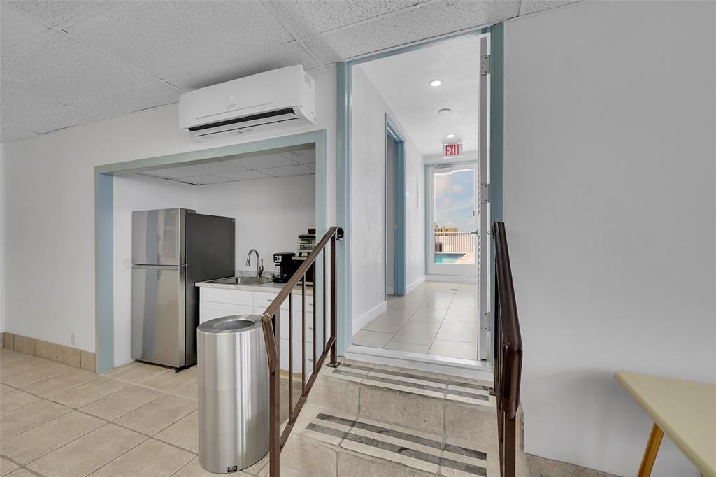 400 North Surf Road, Unit 703 Hollywood, FL 33019 - Photo 39 of 50 a view of a hallway view with staircase