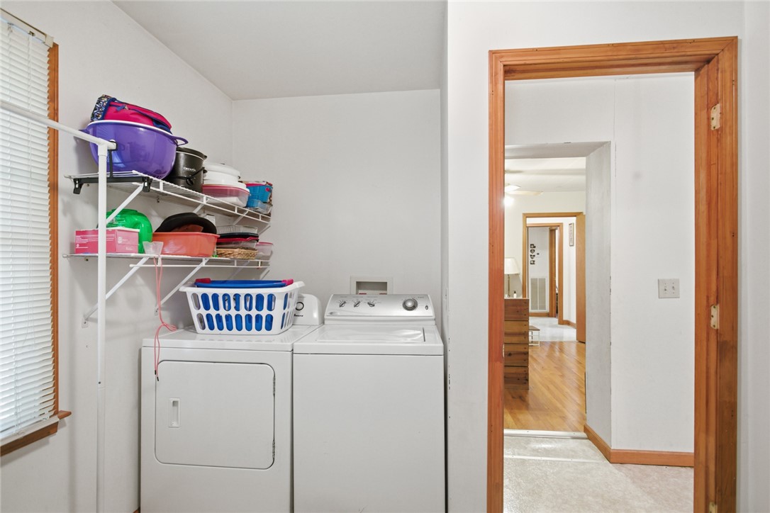 282 West Bennett Road Westminster, SC 29693 - Photo 28 of 42 This dedicated space offers convenience for laundry tasks with functional shelving.