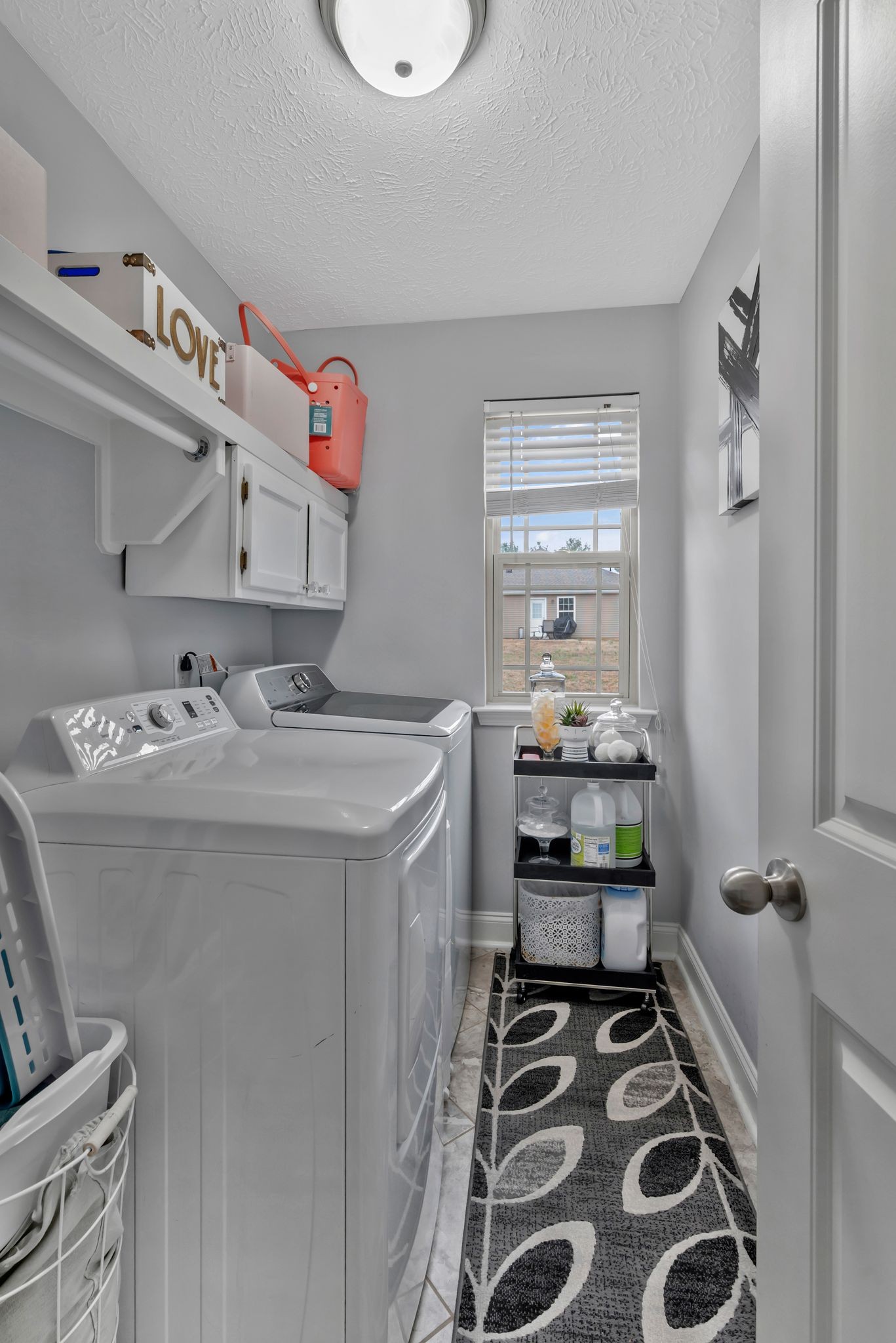 1043 Berra Drive Springfield, TN 37172 - Photo 21 of 33 a bathroom with a sink and a mirror