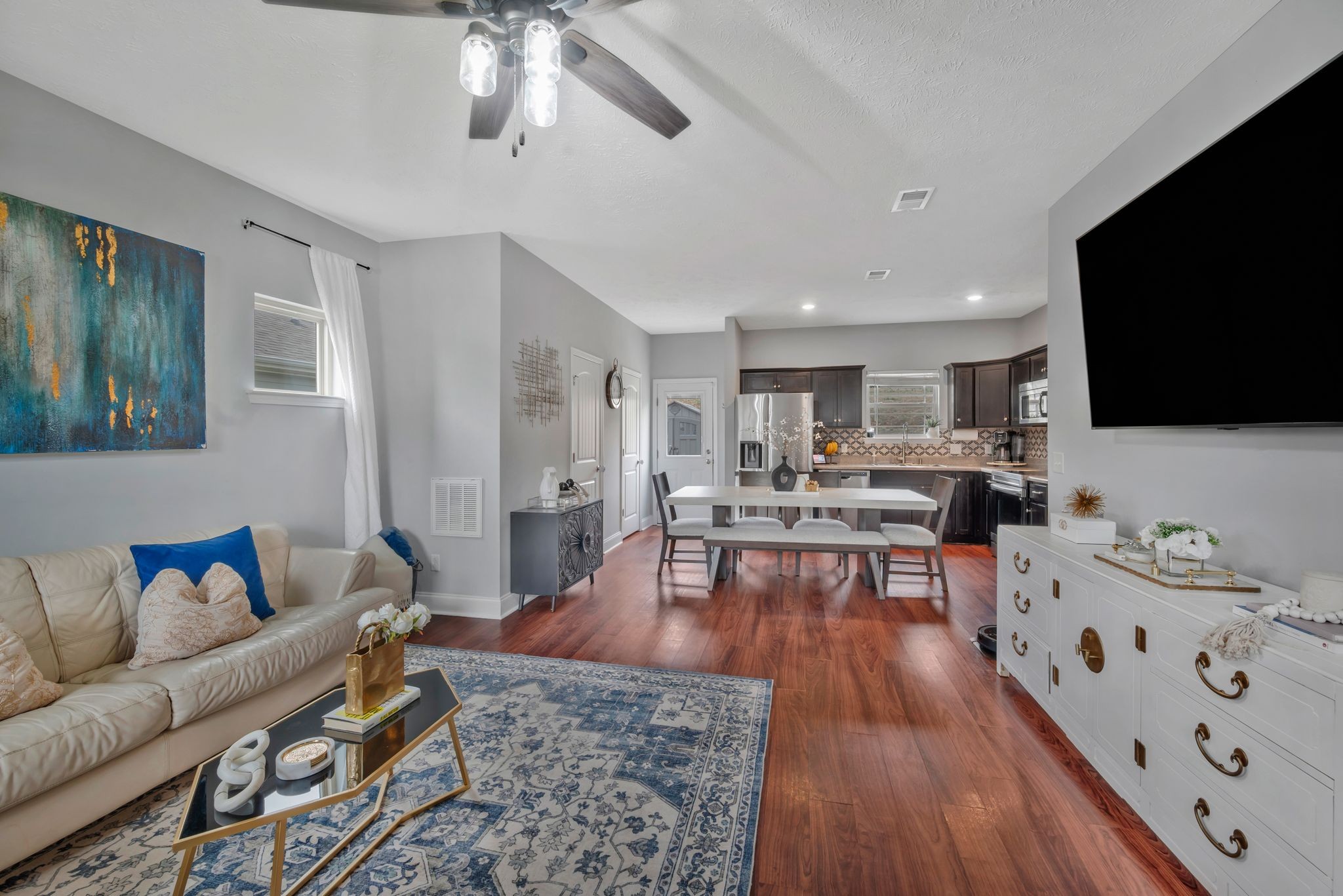 1043 Berra Drive Springfield, TN 37172 - Photo 6 of 33 a living room with furniture and a flat screen tv
