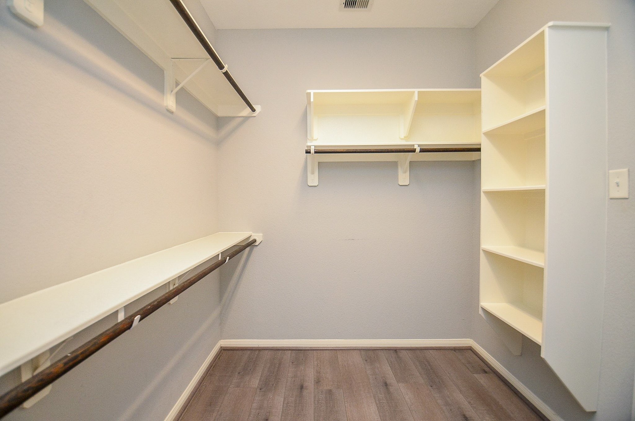 7042 Sliding Rock Circle Spring, TX 77379 - Photo 13 of 36 Expansive Walk-In Closet for All Your Storage Needs