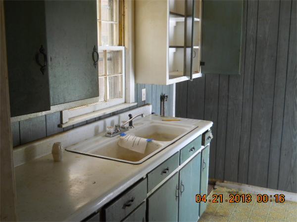39 Bernard Street Springfield, MA 01109 - Photo 5 of 5 a bathroom with a sink and a mirror