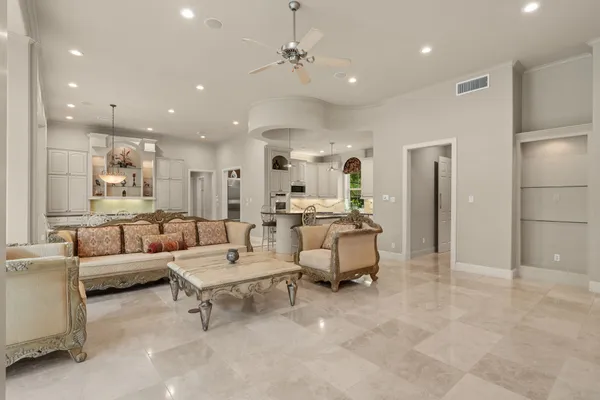 a view of an empty room with windows