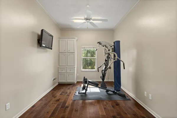 a spacious bathroom with a shower and a sink