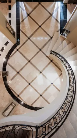 a view of living room with furniture and a chandelier