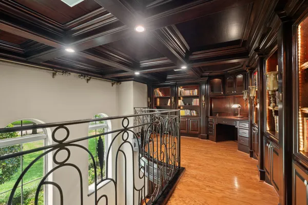 a kitchen with granite countertop a sink and a stove next to a window