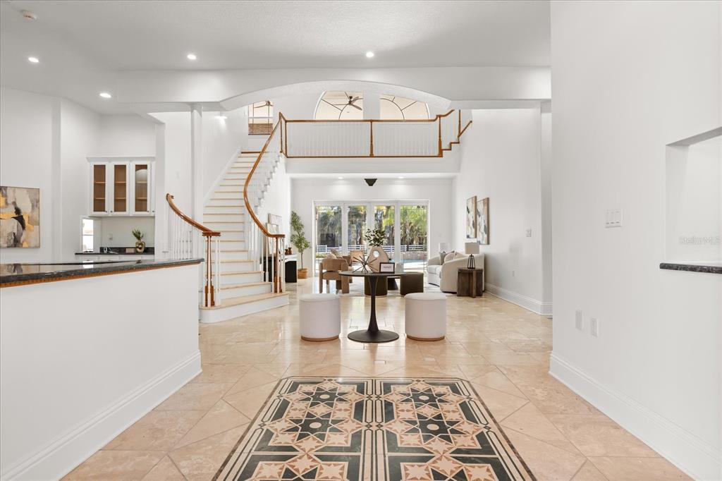 1501 Lake Markham Road Sanford, FL 32771 - Photo 13 of 93 a living room with furniture and a chandelier