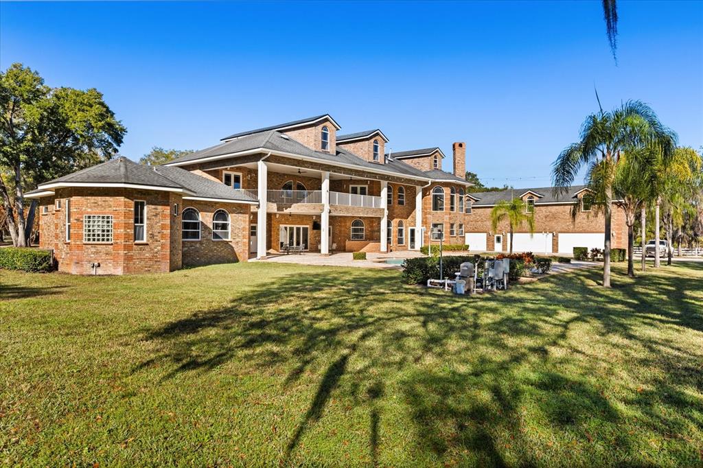 1501 Lake Markham Road Sanford, FL 32771 - Photo 37 of 93 a view of a house with a swimming pool