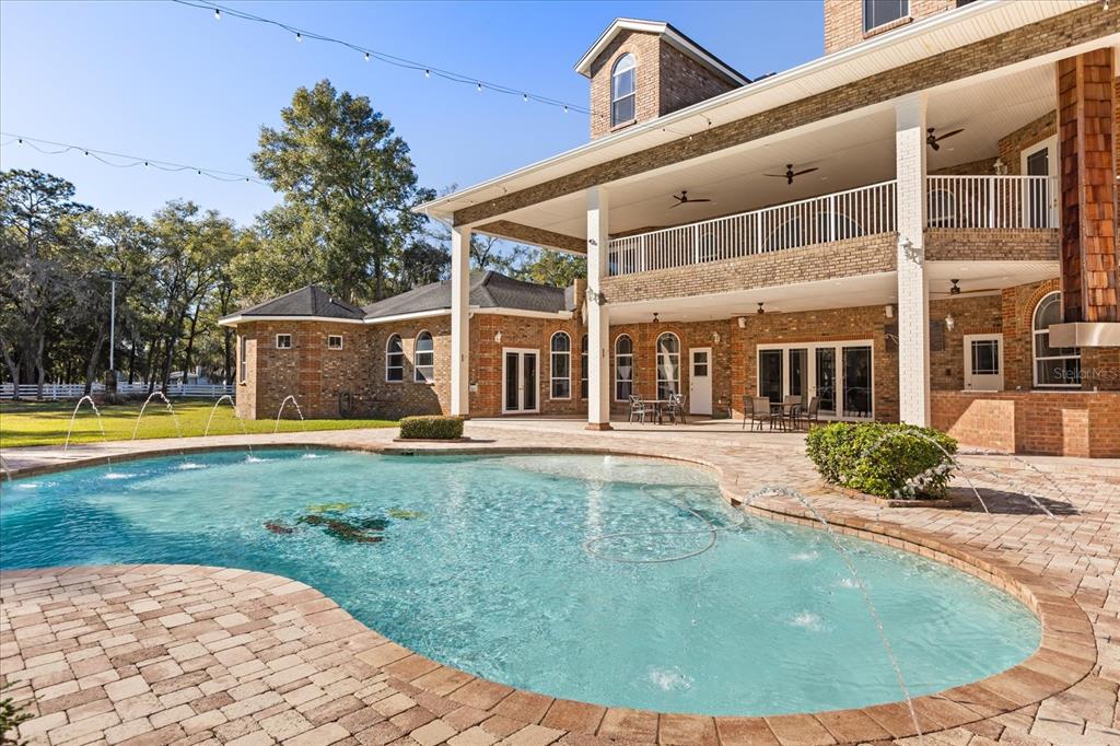 1501 Lake Markham Road Sanford, FL 32771 - Photo 42 of 93 a view of a house with swimming pool