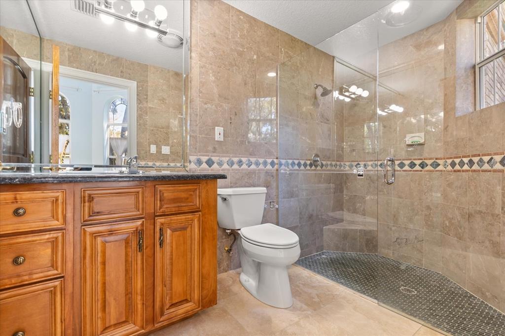 1501 Lake Markham Road Sanford, FL 32771 - Photo 56 of 93 a bathroom with a sink a toilet and shower