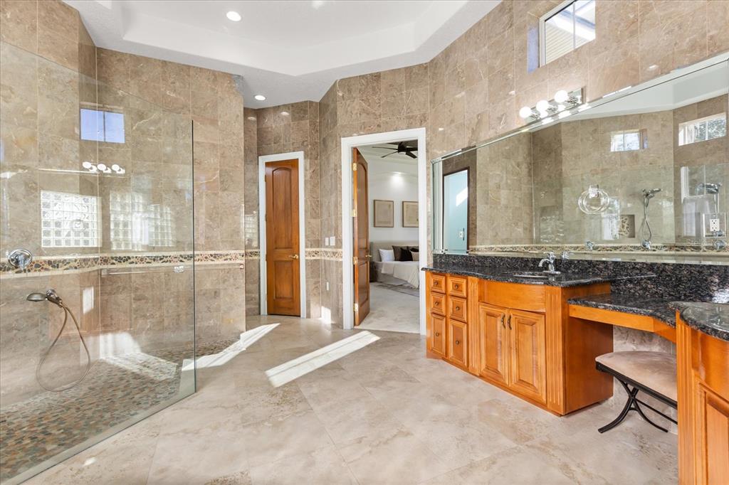 1501 Lake Markham Road Sanford, FL 32771 - Photo 65 of 93 a large bathroom with a tub and sink