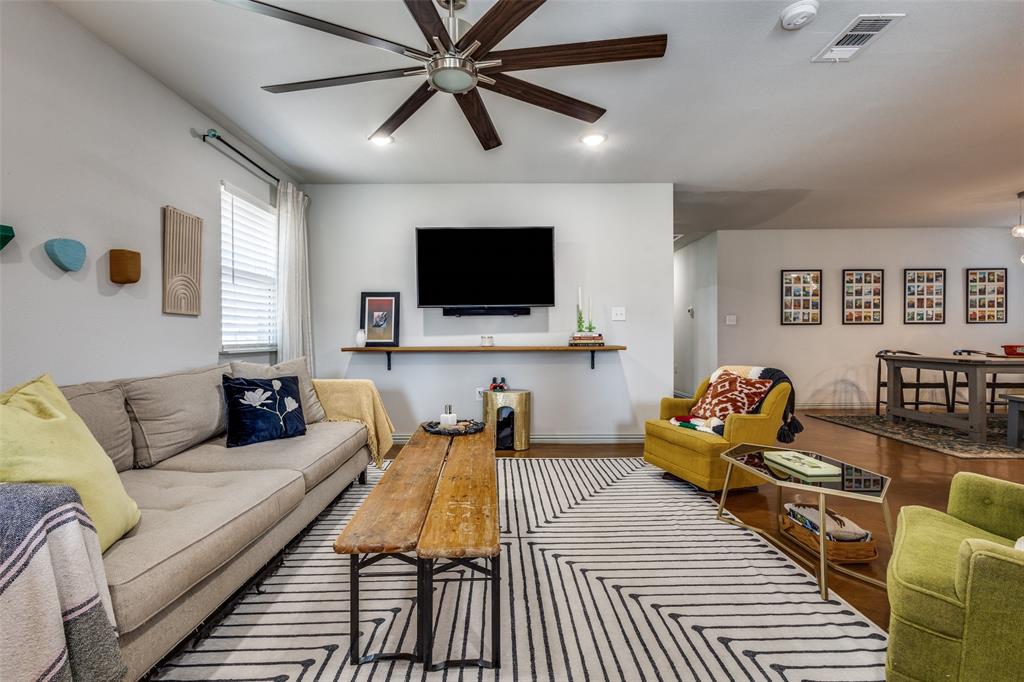 409 West Johnson Street Denison, TX 75020 - Photo 4 of 25 a living room with furniture and a flat screen tv