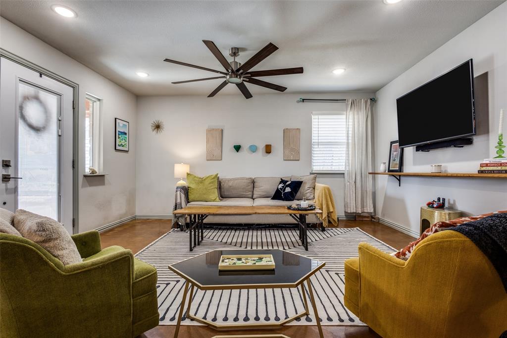 409 West Johnson Street Denison, TX 75020 - Photo 7 of 25 a living room with furniture and a flat screen tv