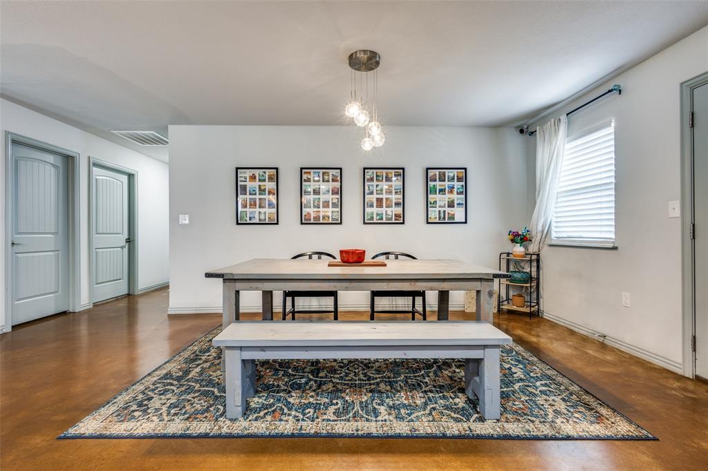 409 West Johnson Street Denison, TX 75020 - Photo 9 of 25 a view of a living room and dining area