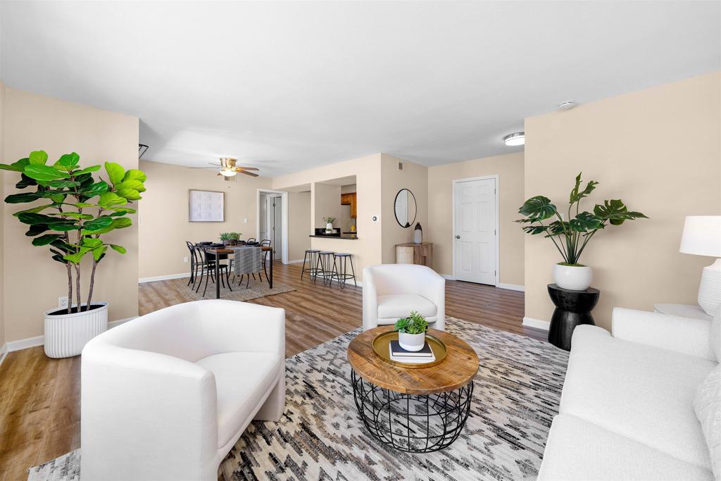 6775 Alvarado Road, Unit 7 San Diego, CA 92120 - Photo 1 of 24 a living room with furniture potted plant and a table