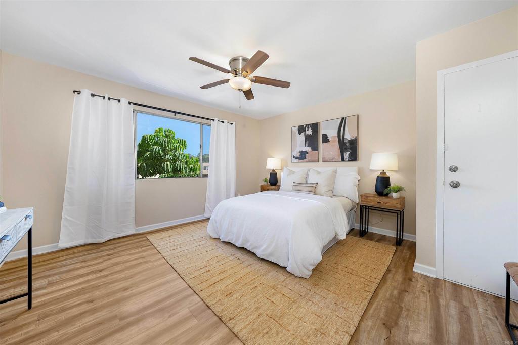 6775 Alvarado Road, Unit 7 San Diego, CA 92120 - Photo 17 of 24 a bedroom with a bed and a window