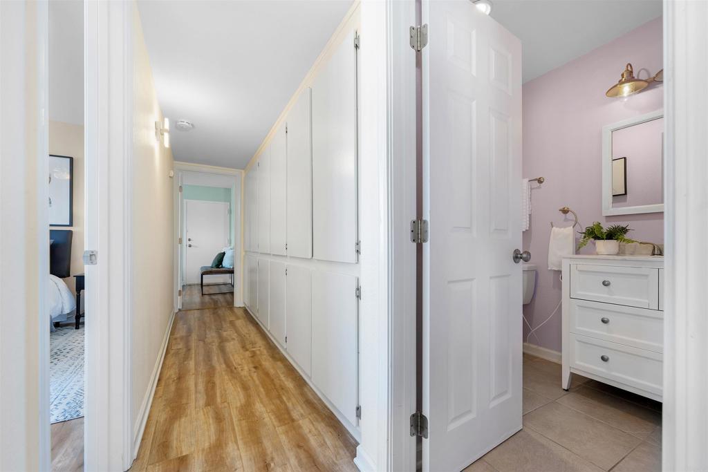 6775 Alvarado Road, Unit 7 San Diego, CA 92120 - Photo 21 of 24 a view of a hallway with closet and cabinet