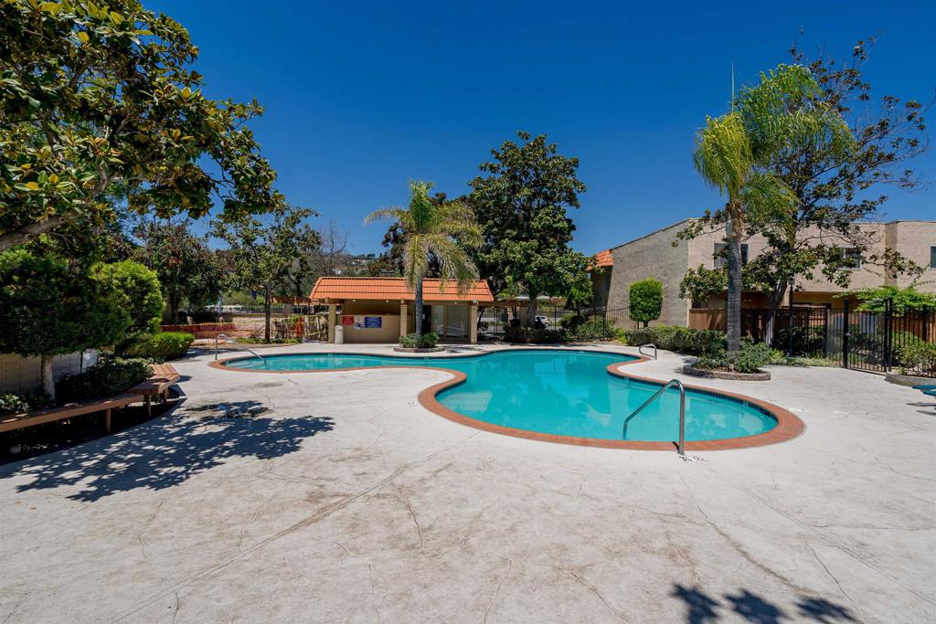 6775 Alvarado Road, Unit 7 San Diego, CA 92120 - Photo 23 of 24 a swimming pool with outdoor seating and yard