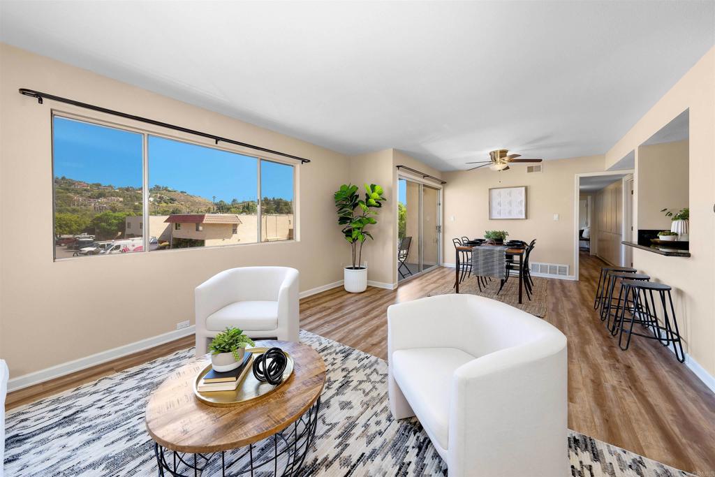6775 Alvarado Road, Unit 7 San Diego, CA 92120 - Photo 5 of 24 a living room with furniture and a table