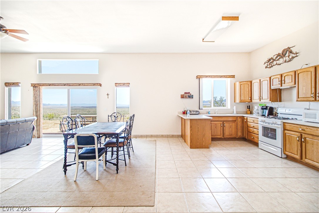 Rocking S Ranch Road Searchlight, NV 89046 - Photo 47 of 47 An open floorplan combines kitchen and dining, overlooking vast, captivating views.
