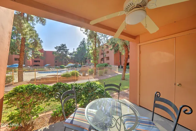 a view of a porch with a sitting area
