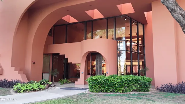 a view of a front of a house with a yard