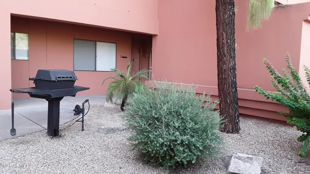 a house view with a garden space