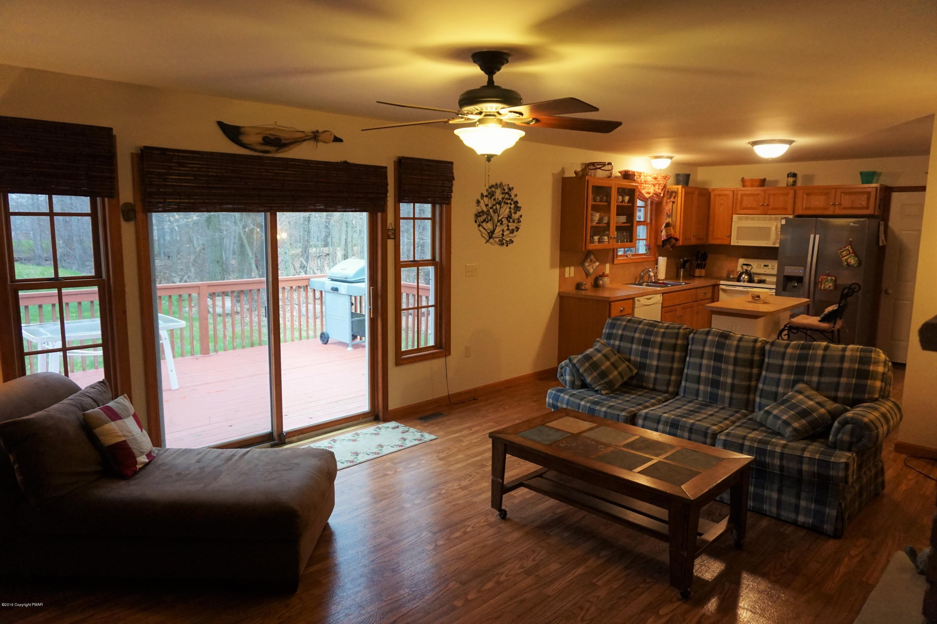 4194 Hickory Road Tobyhanna, PA 18466 - Photo 8 of 29 a living room with furniture and a chandelier