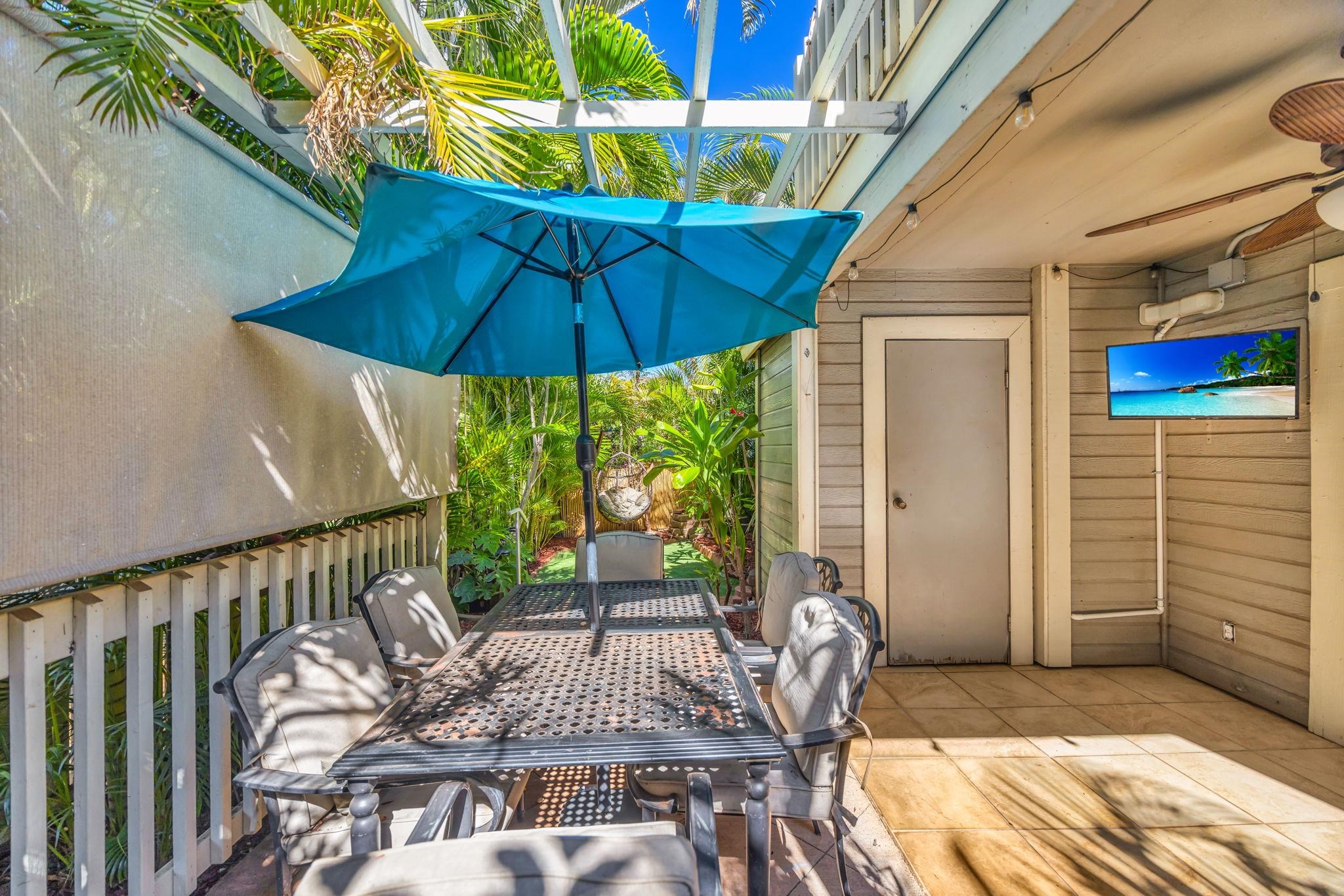 140 Uwapo Road, Unit 36104 Kihei, HI 96753 - Photo 26 of 33 a view of balcony with furniture and umbrella