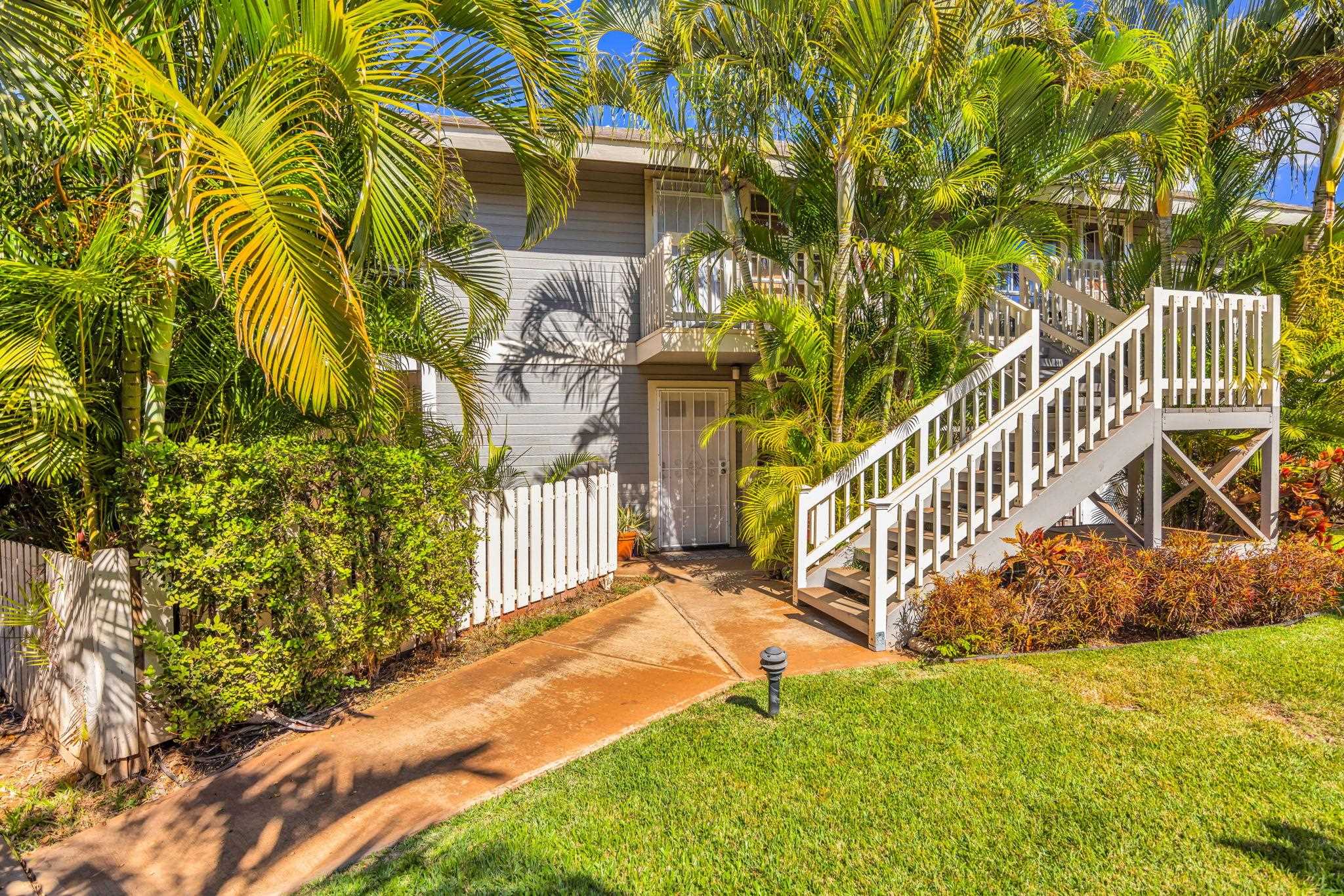 140 Uwapo Road, Unit 36104 Kihei, HI 96753 - Photo 8 of 33 a view of an house with a yard and sitting area