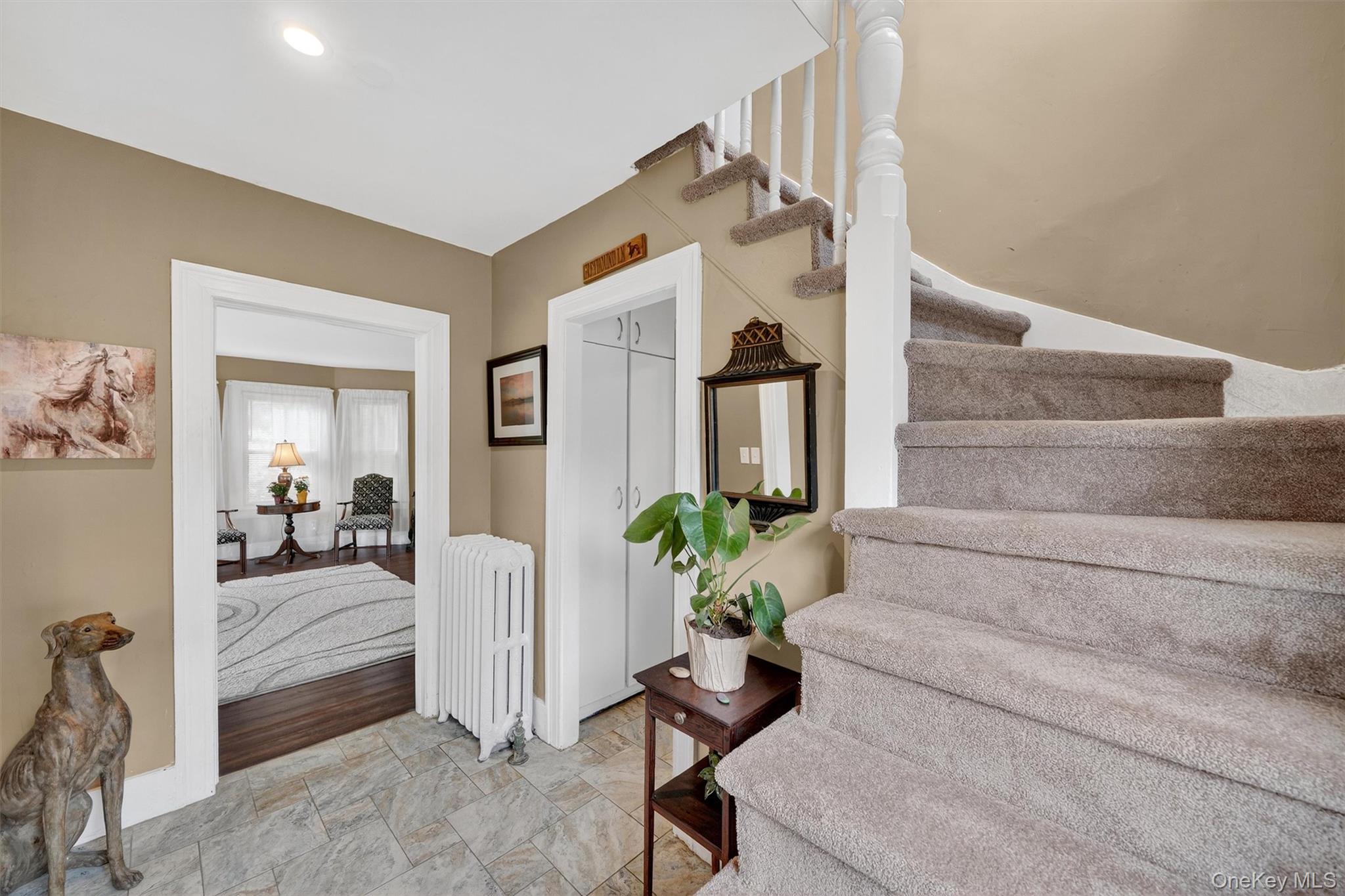 134 Dalmeny Road Briarcliff Manor, NY 10510 - Photo 19 of 44 a living room with furniture and a potted plant