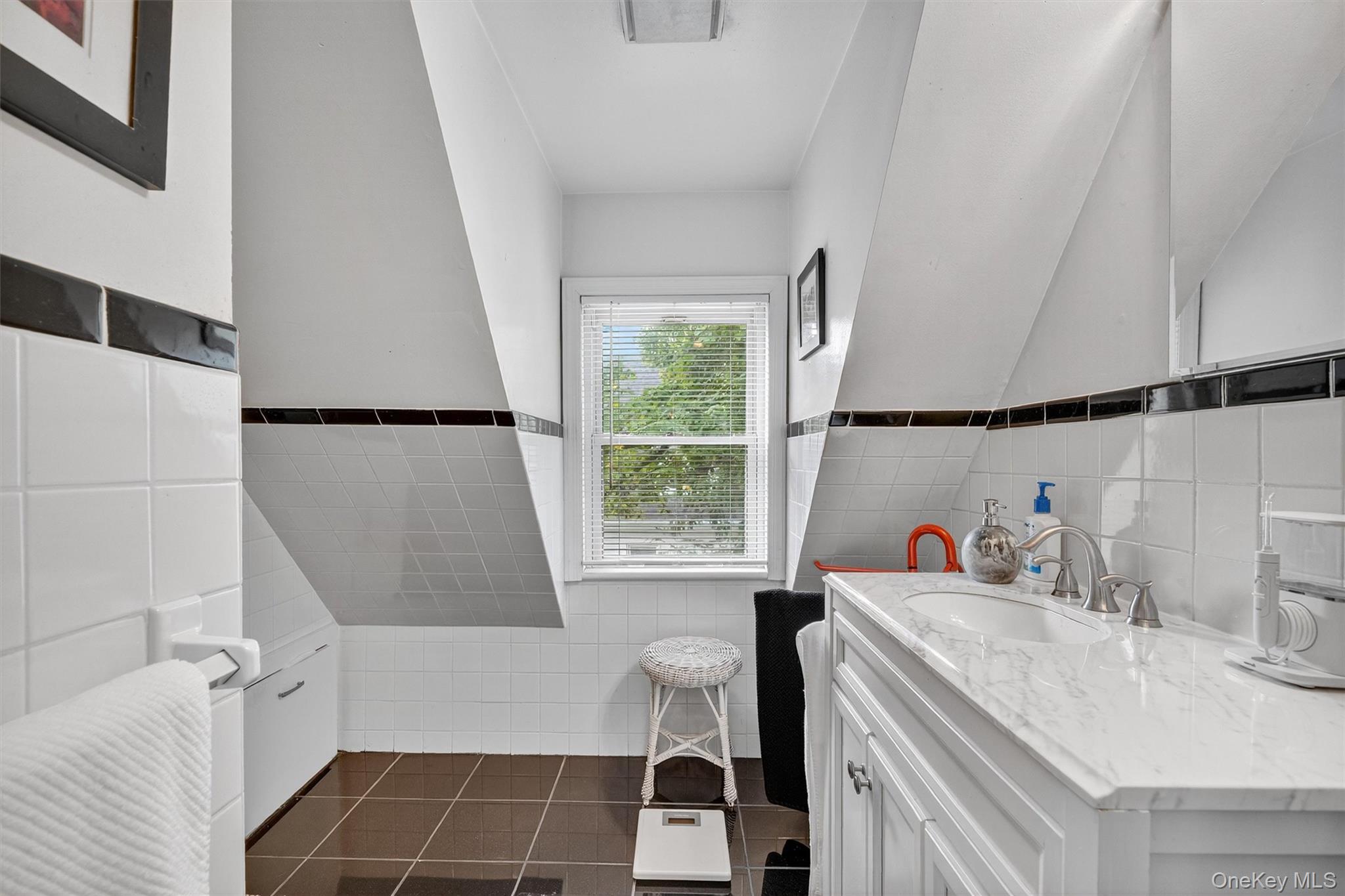 134 Dalmeny Road Briarcliff Manor, NY 10510 - Photo 21 of 44 a bathroom with a sink and a bathtub