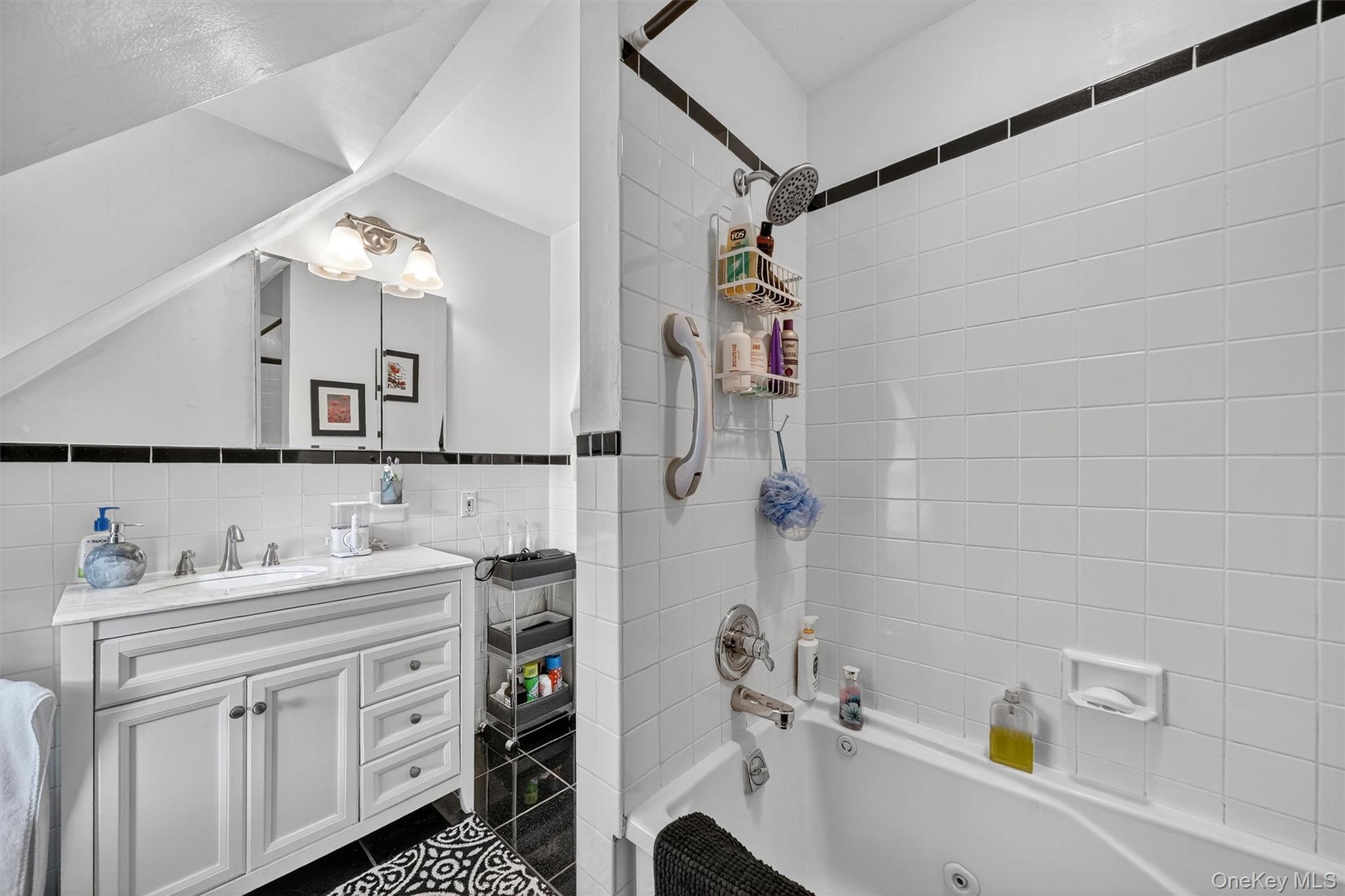 134 Dalmeny Road Briarcliff Manor, NY 10510 - Photo 22 of 44 a bathroom with a sink and a mirror