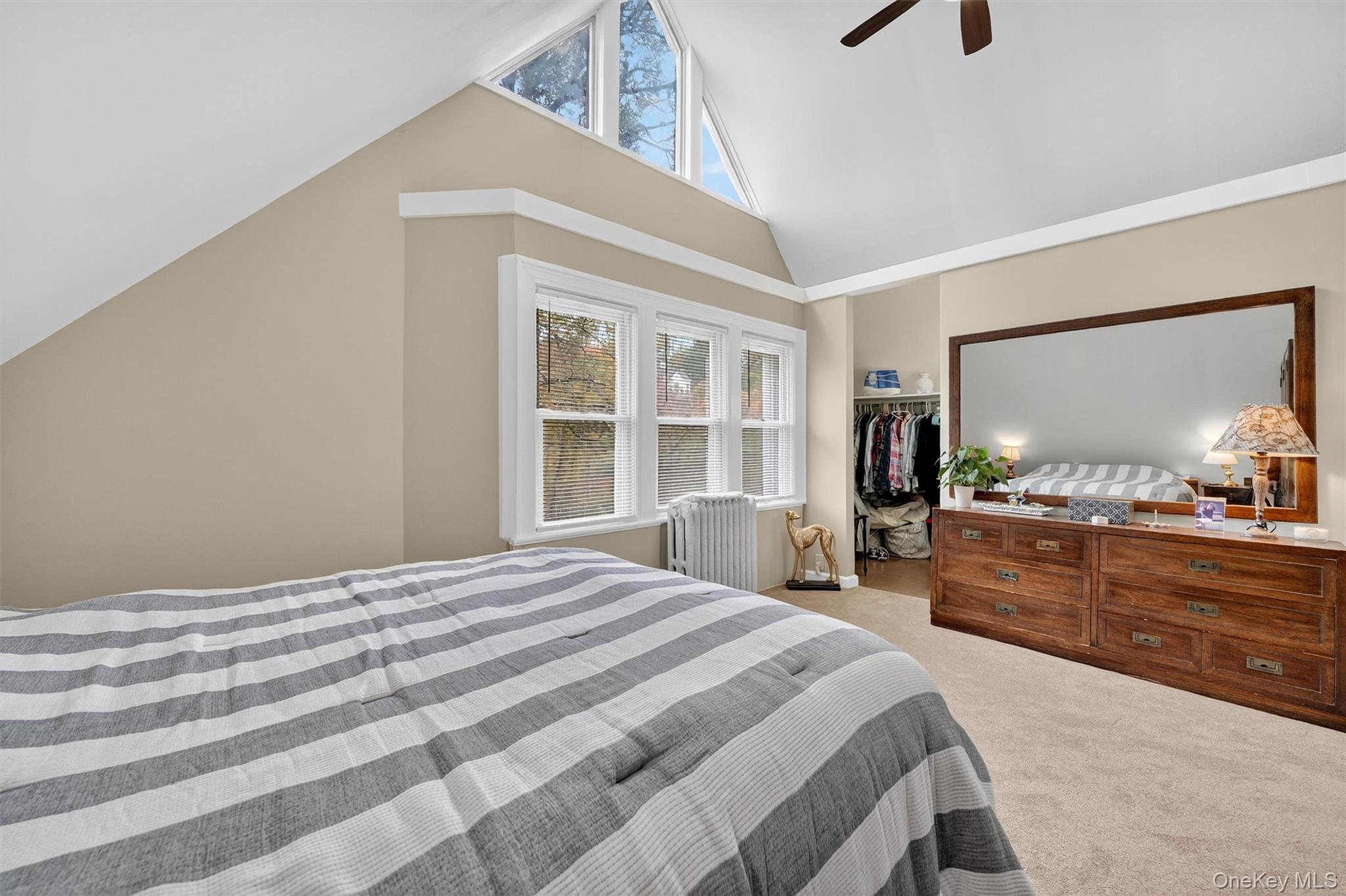 134 Dalmeny Road Briarcliff Manor, NY 10510 - Photo 25 of 44 a bedroom with a bed window and dresser