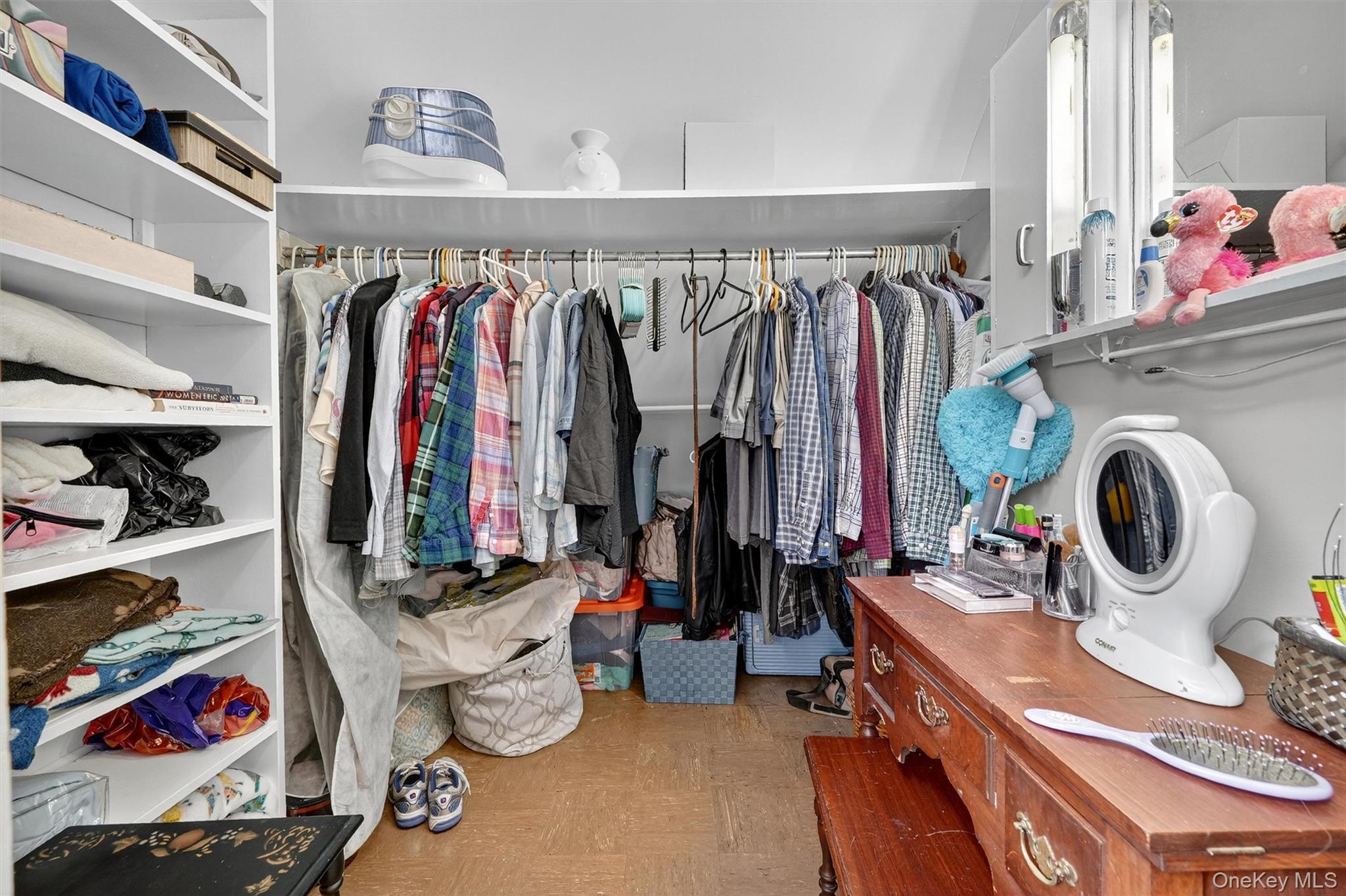 134 Dalmeny Road Briarcliff Manor, NY 10510 - Photo 26 of 44 a view of walk in closet with clothes and shoes