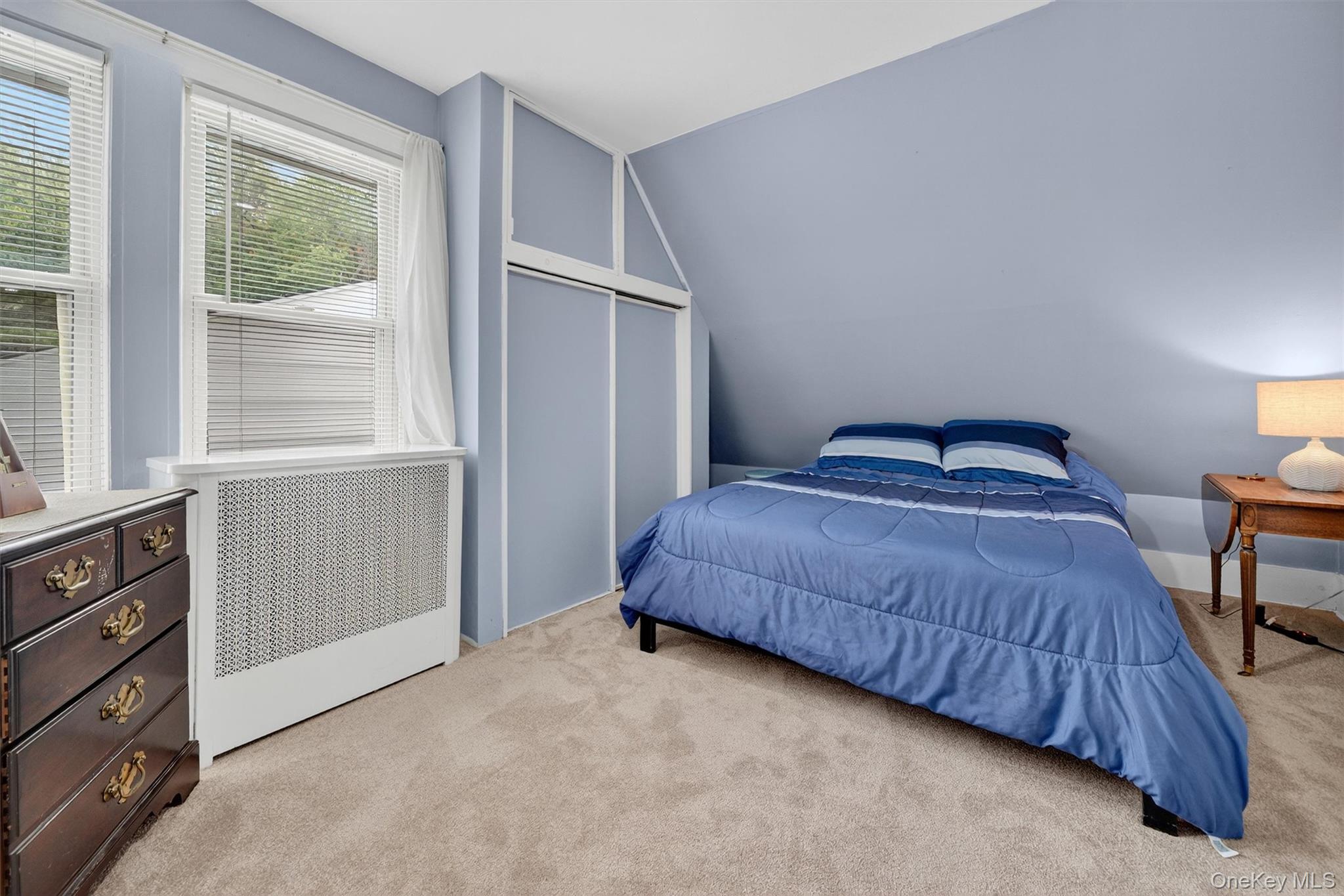 134 Dalmeny Road Briarcliff Manor, NY 10510 - Photo 28 of 44 a bedroom with a bed and window