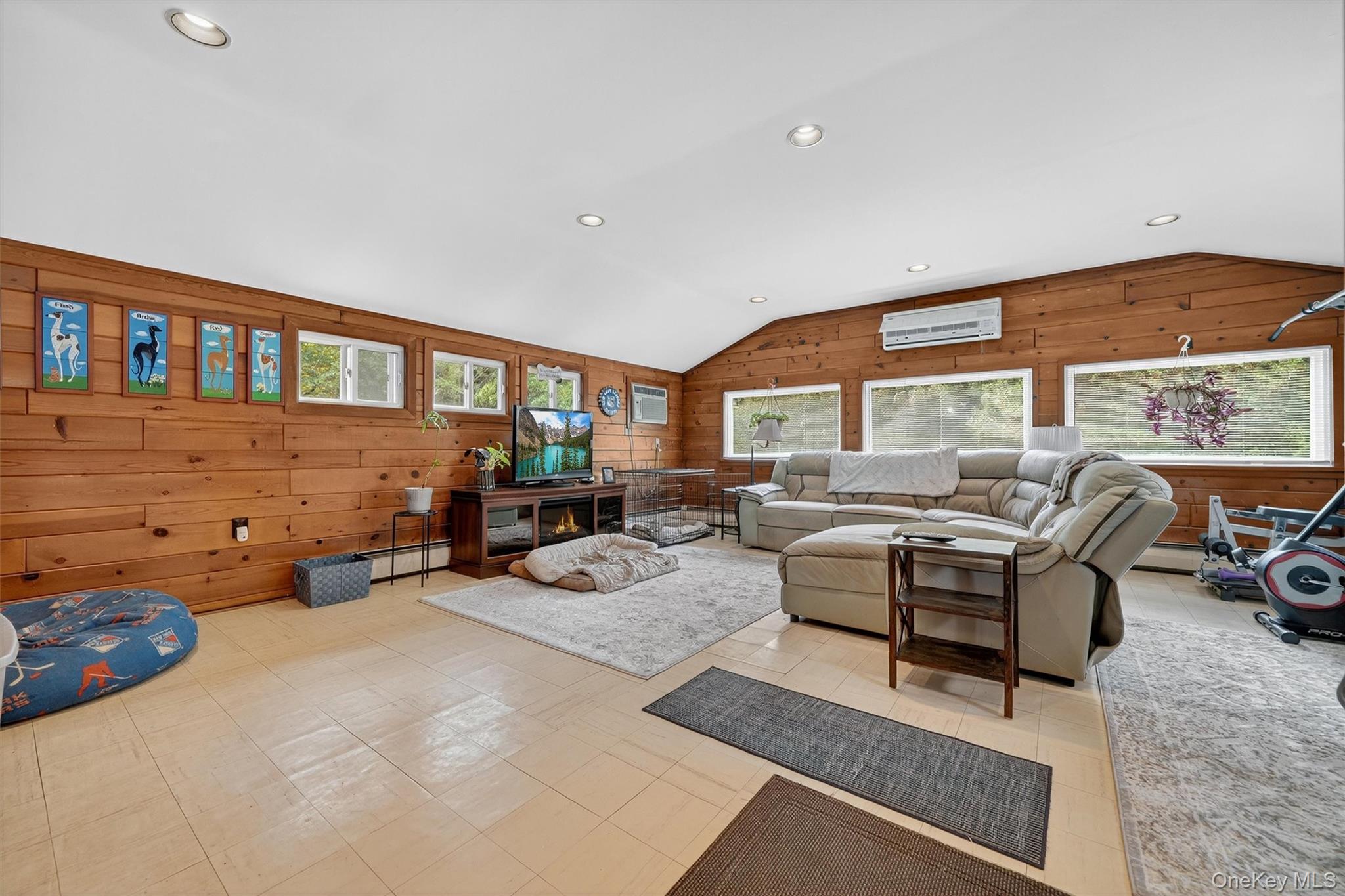 134 Dalmeny Road Briarcliff Manor, NY 10510 - Photo 30 of 44 a living room with furniture fireplace and a large window