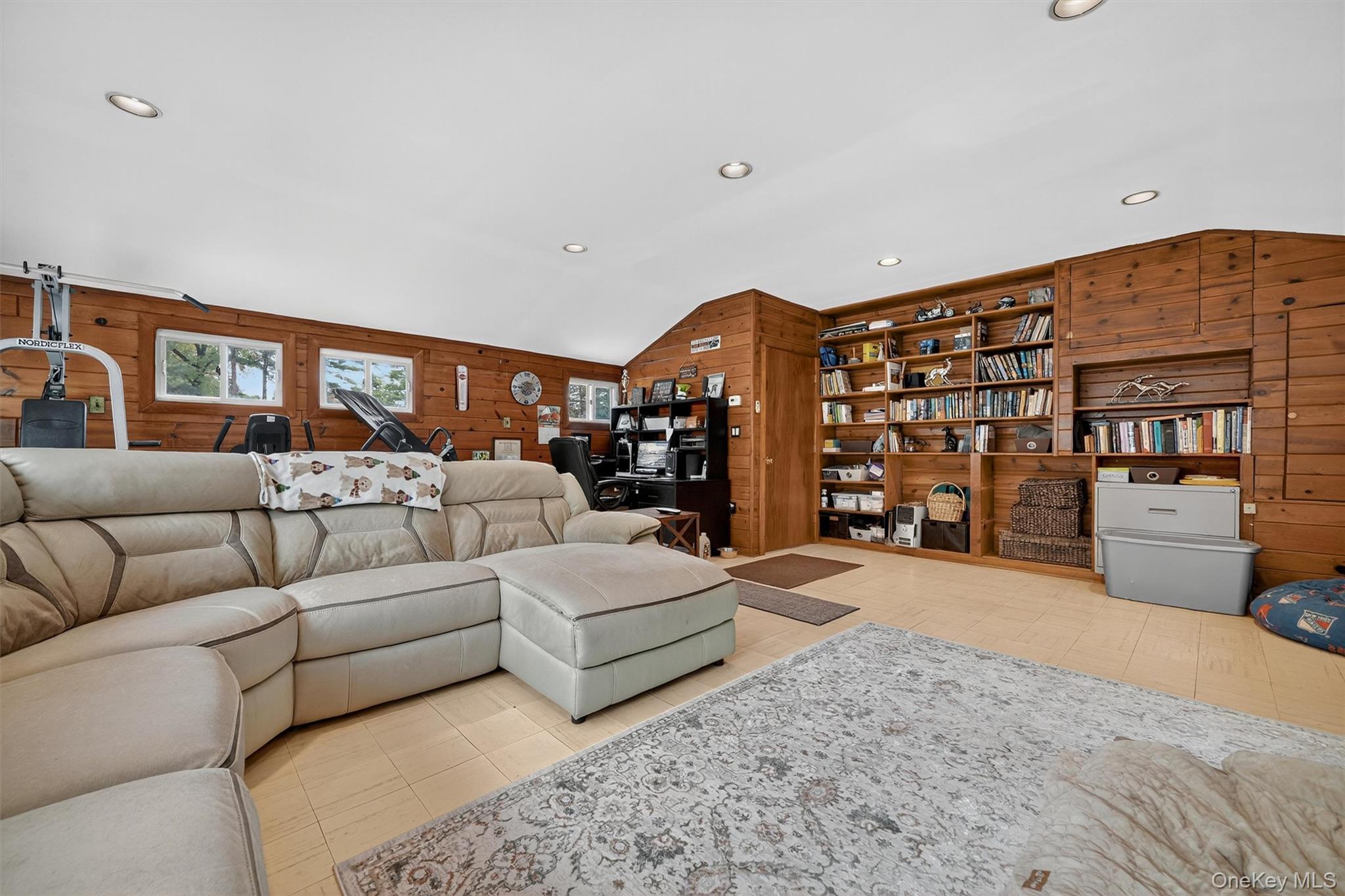 134 Dalmeny Road Briarcliff Manor, NY 10510 - Photo 33 of 44 a living room with furniture a rug and a large window