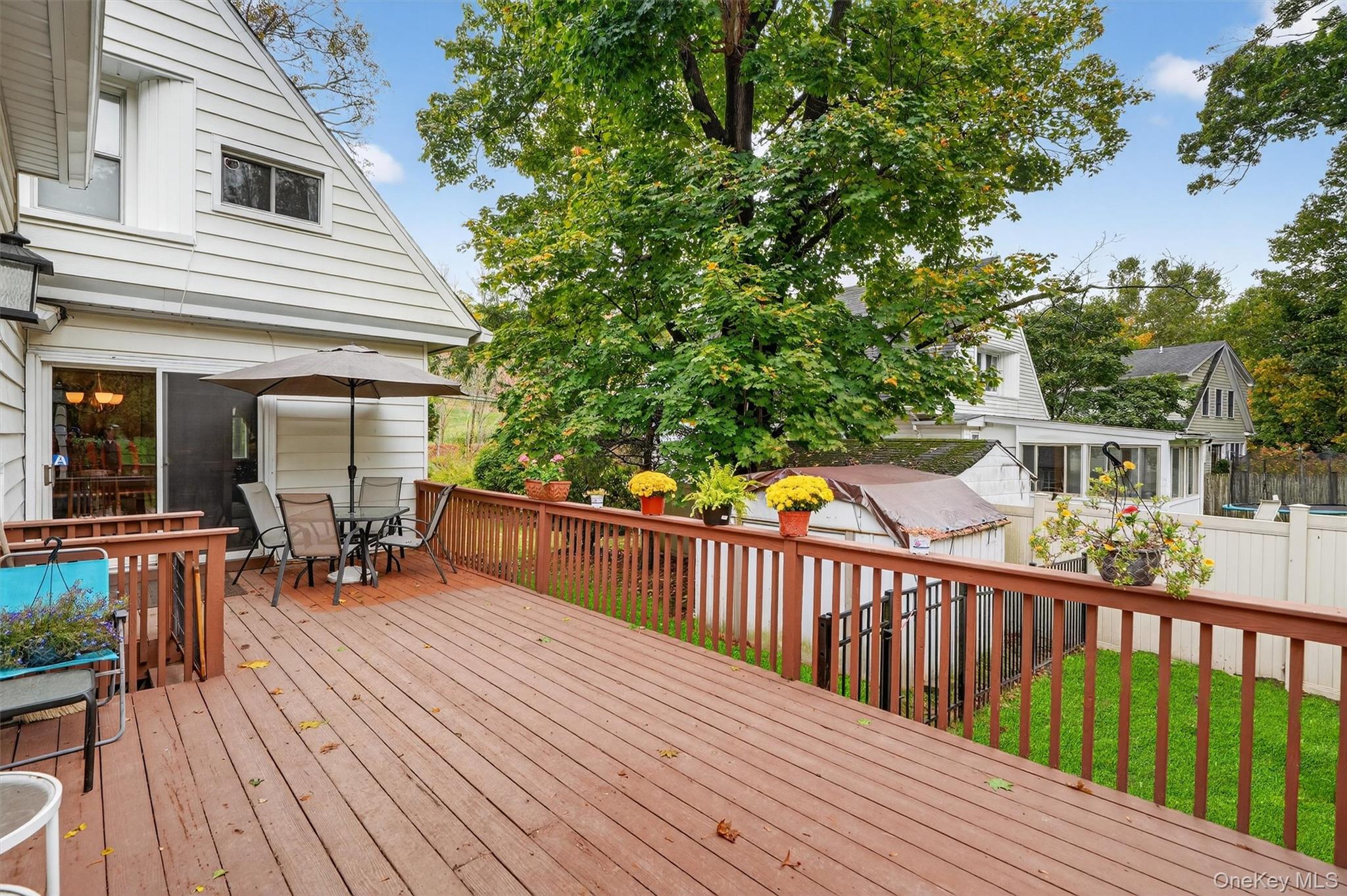 134 Dalmeny Road Briarcliff Manor, NY 10510 - Photo 35 of 44 a view of a house with sitting area and wooden floor