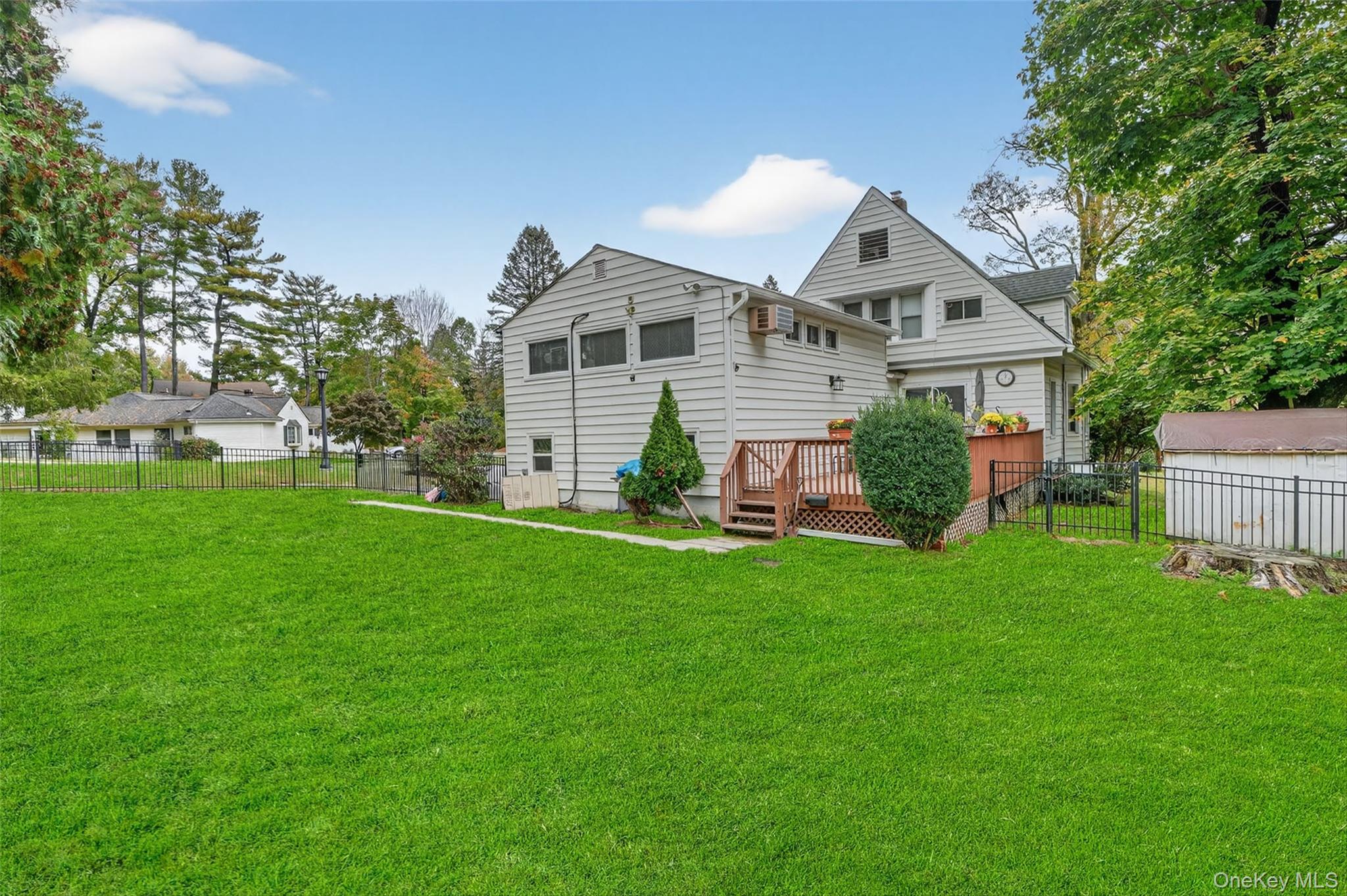 134 Dalmeny Road Briarcliff Manor, NY 10510 - Photo 40 of 44 a front view of house with yard and green space