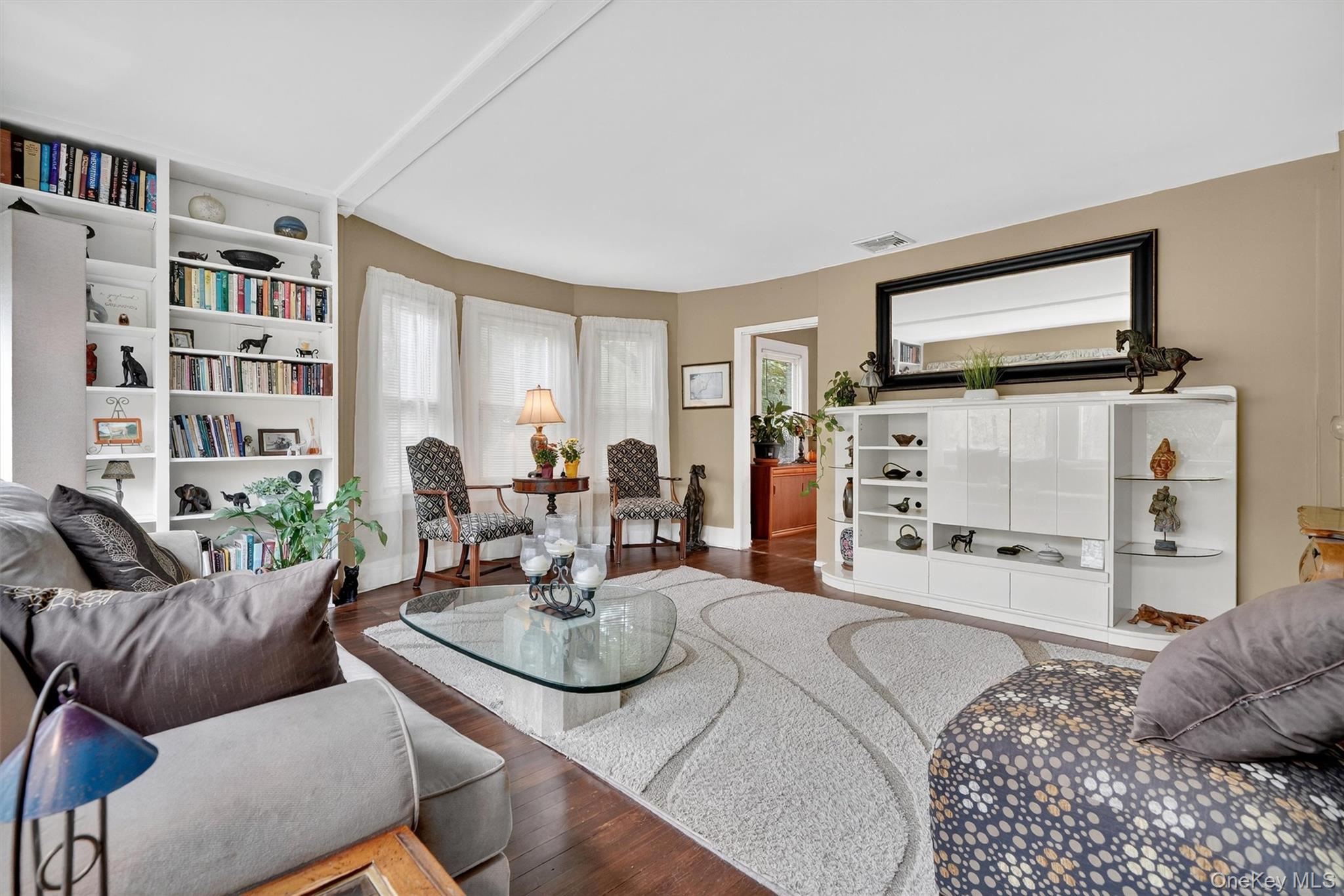 134 Dalmeny Road Briarcliff Manor, NY 10510 - Photo 9 of 44 a living room with furniture and a flat screen tv