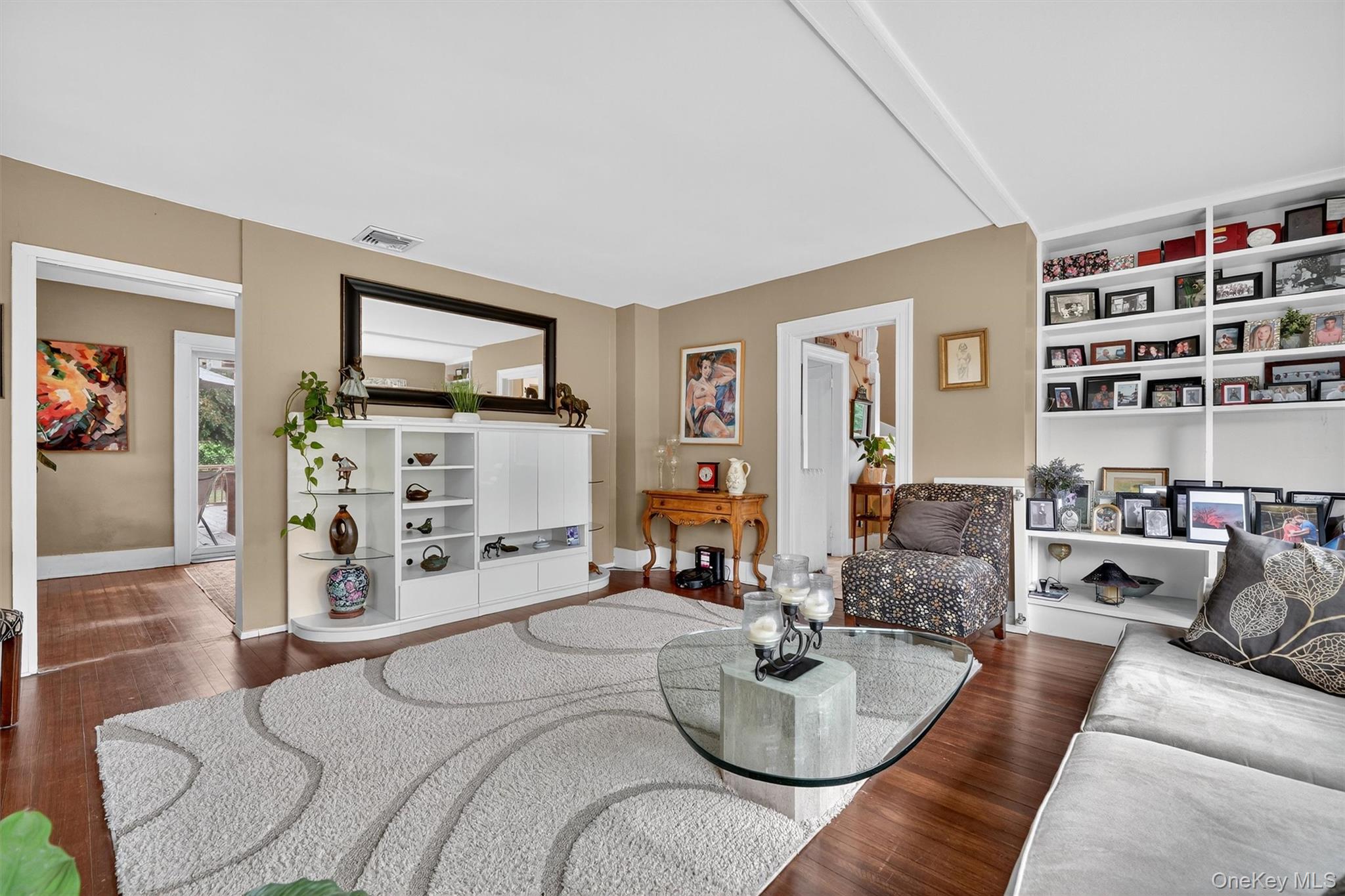 134 Dalmeny Road Briarcliff Manor, NY 10510 - Photo 10 of 44 a bedroom with furniture and a flat screen tv