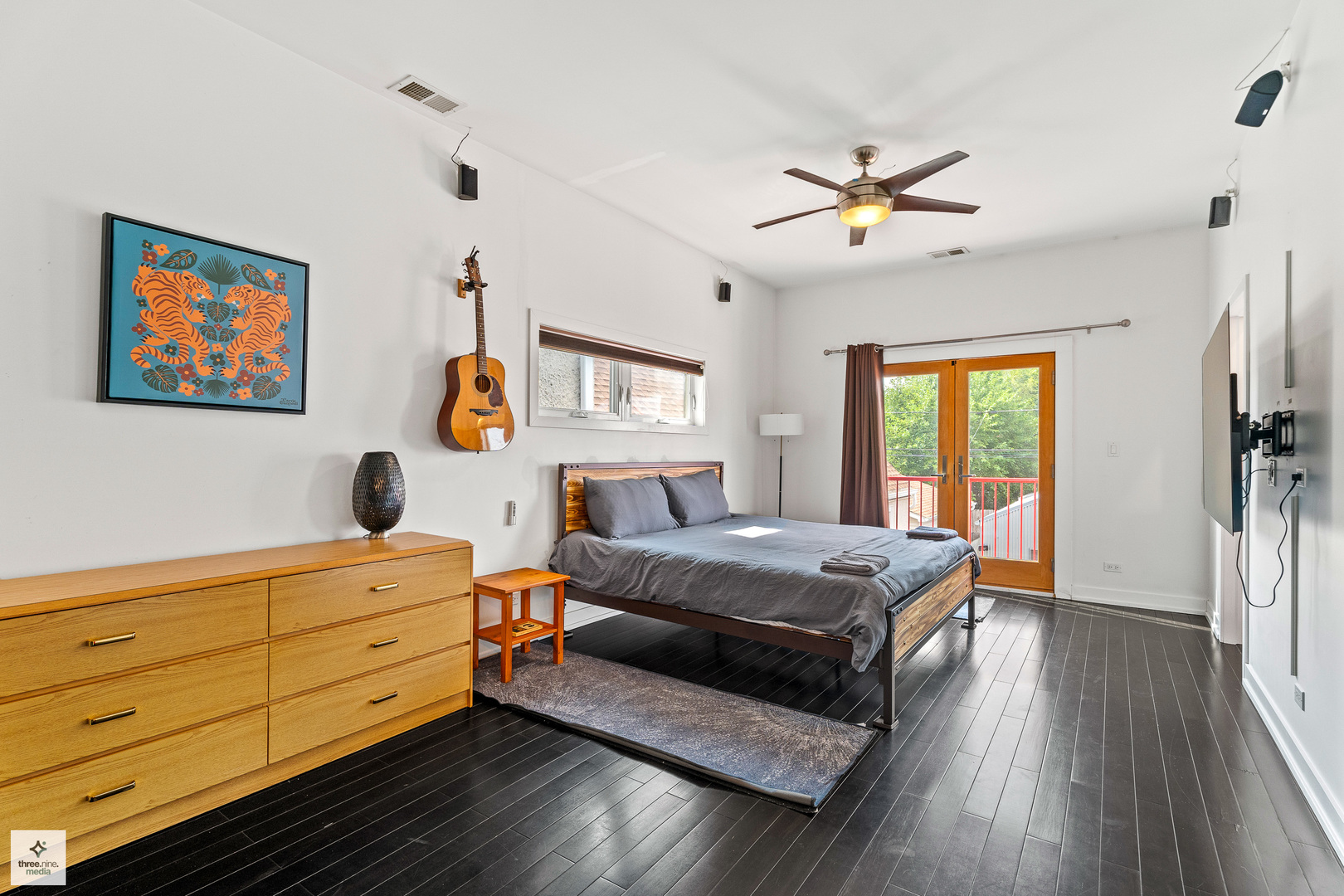 3036 North Gresham Avenue Chicago, IL 60618 - Photo 13 of 31 a bedroom with a bed and a chandelier